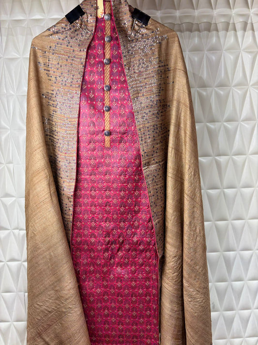 Timeless elegance in every detail A silk suit adorned with intricate thread