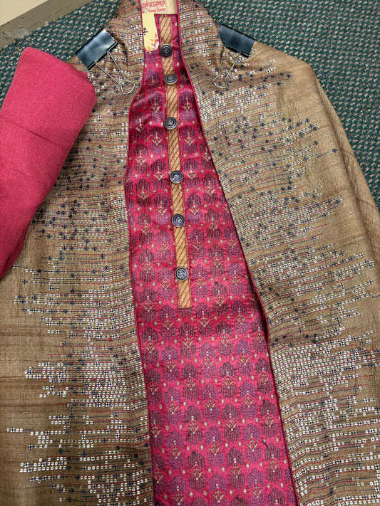 Timeless elegance in every detail A silk suit adorned with intricate thread