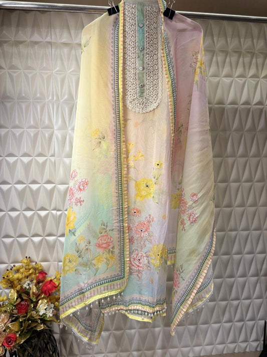 Soft organza suit set with work all over the shirt &  neckline with stones