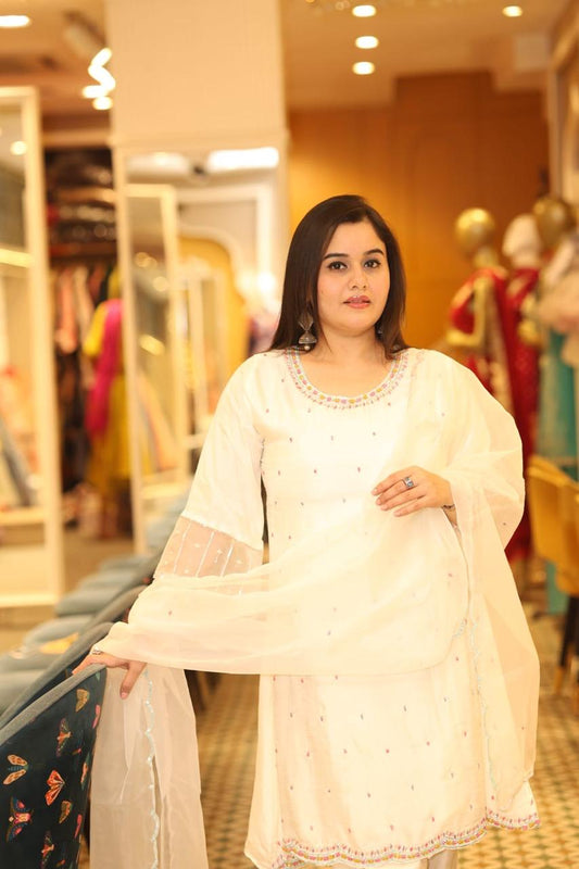 Elevate your style with this  white ready -made suit set with Small bootis