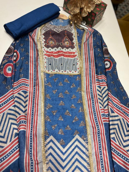 Embrace summer in style with this Muslin printed suit set