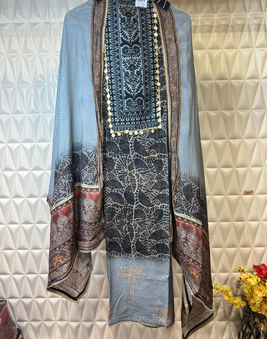 Embrace summer in style with this Muslin printed suit set