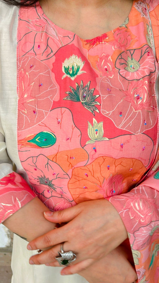 Elevate your style with this mehndi green ready-made suit set.