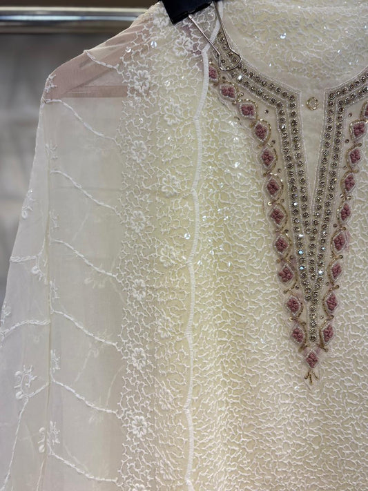 Embrace summer in style with this georgette suit set in Chikankari work