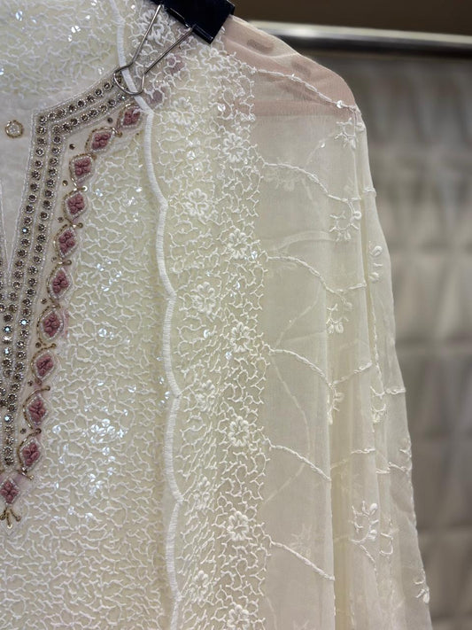 Embrace summer in style with this georgette suit set in Chikankari work