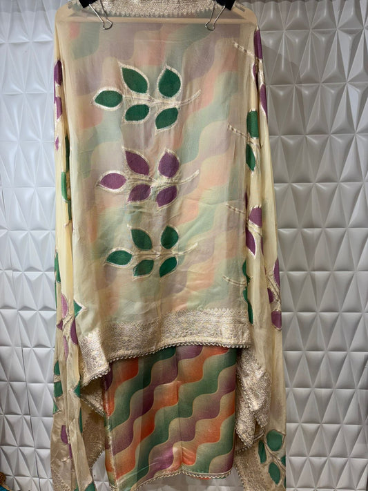 Timeless elegance in every detail. Lovely suit adorned with intricate hand