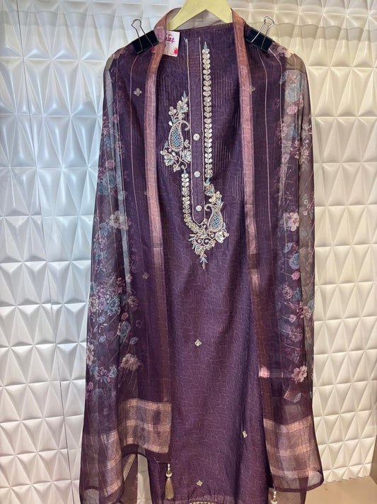 Silk suit set with beautiful Gota Patti kairi motif hand embroidery detailing.