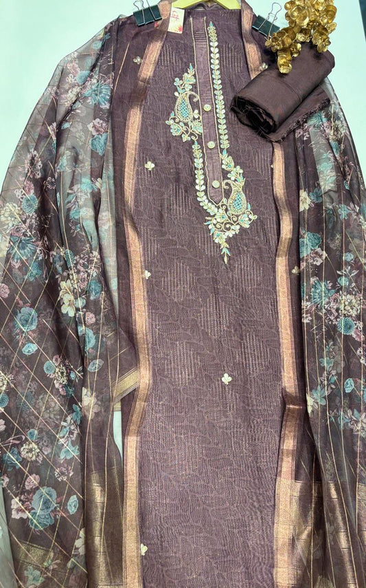 Silk suit set with beautiful Gota Patti kairi motif hand embroidery detailing.