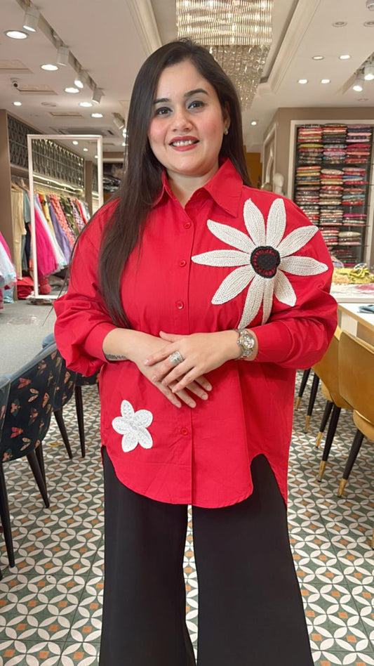 Classy essential with a bold floral patch on the shoulder