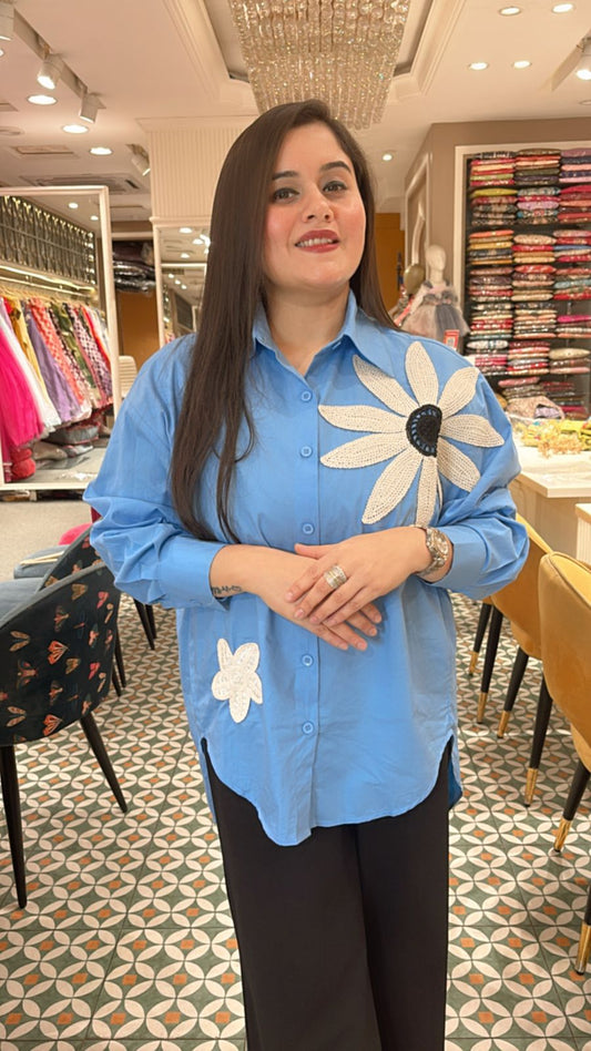 Classy essential with a bold floral patch on the shoulder