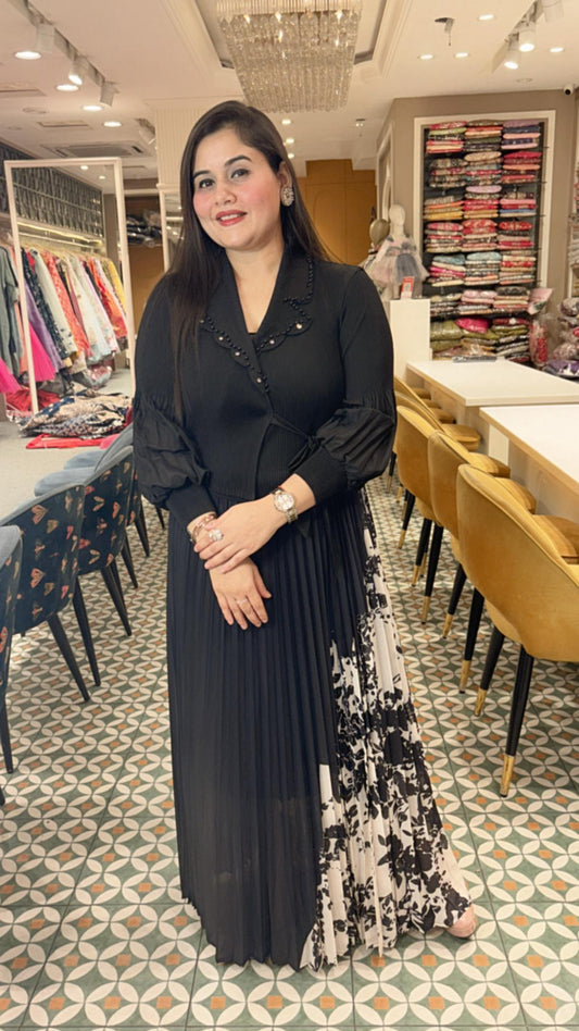 Crafted from breathable cotton Lycra, this pleated dress combines