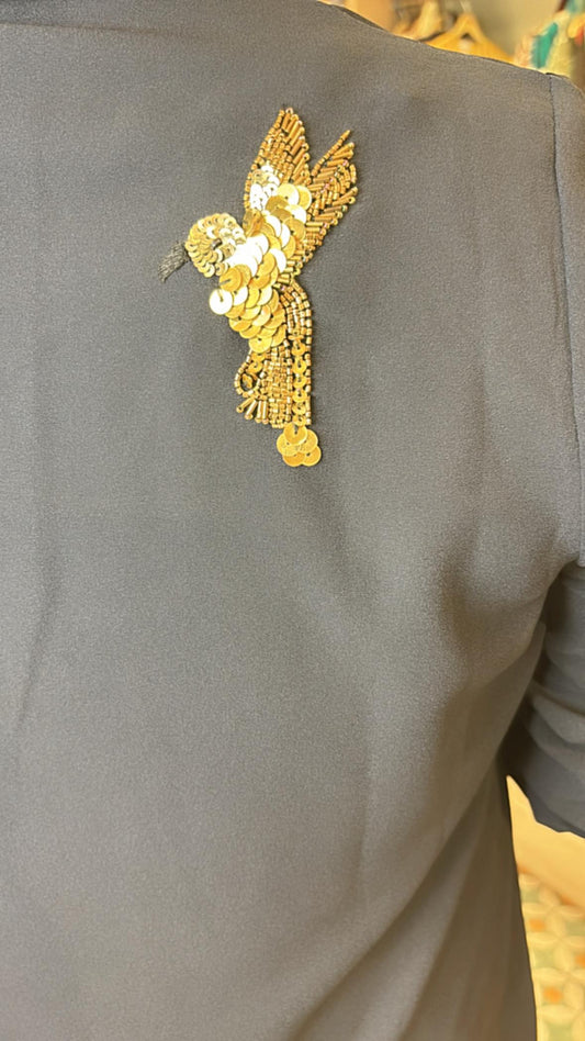 Make a statement at every celebration with our D-shape statement shirt