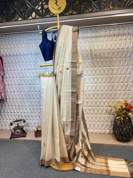 Breathe in elegance – Cotton tissue saree with hand brush painting