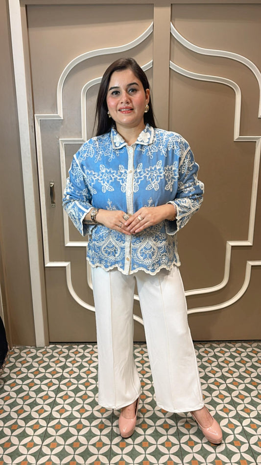 A classic summer shirt with a twist—this cotton-linen piece features soft tailoring