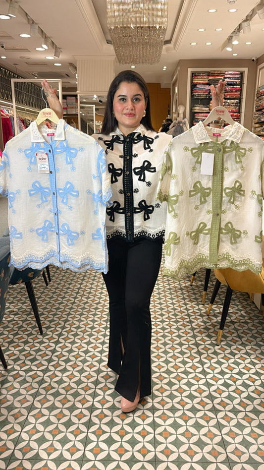 Classic summer shirt with a twist—this cotton-linen piece features soft tailoring