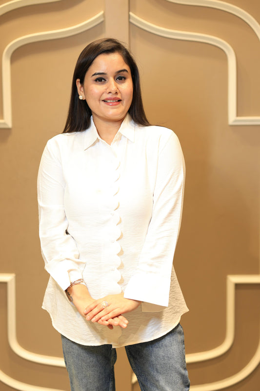 Crafted from soft, premium modal crepe, this breezy shirt offers a relaxed yet refined silhouette.