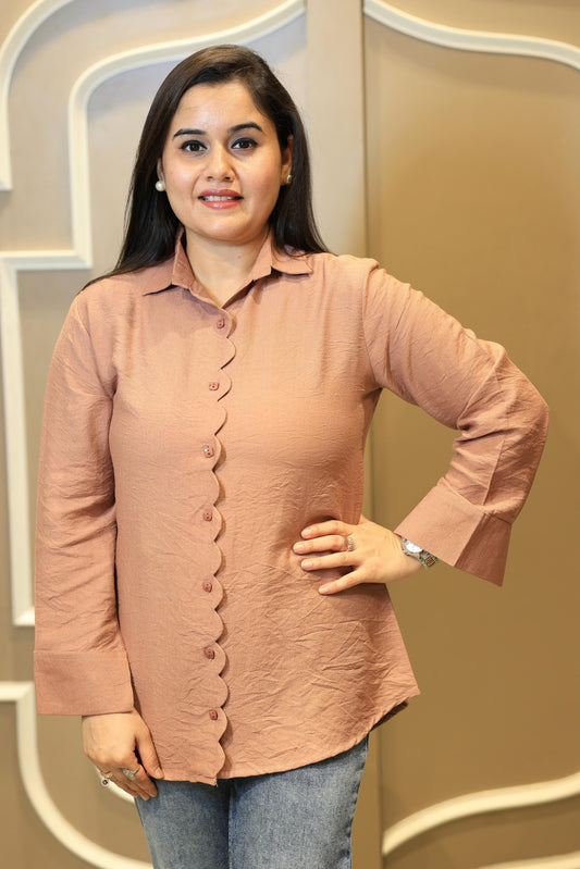 Crafted from soft, premium modal crepe, this breezy shirt offers a relaxed yet refined silhouette.