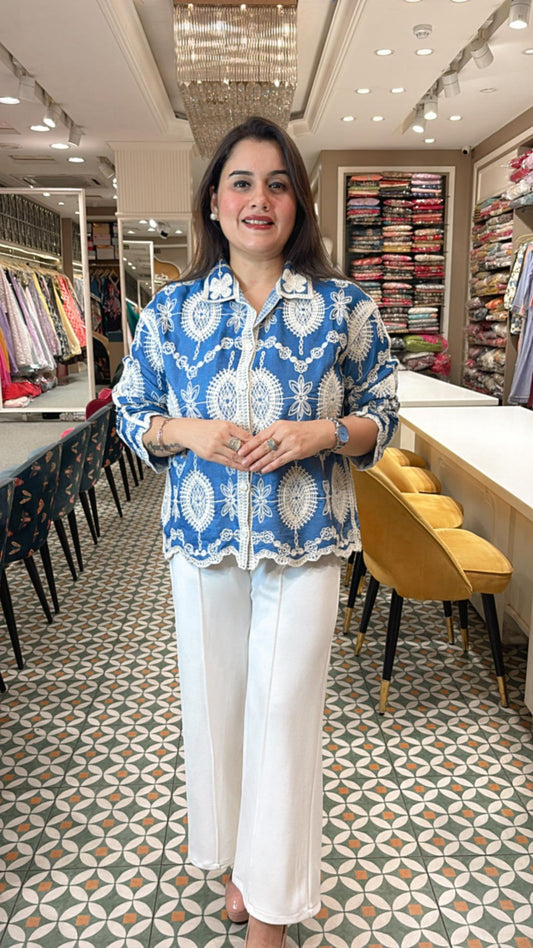 Classic summer shirt with a twist—this cotton-linen piece features soft tailoring