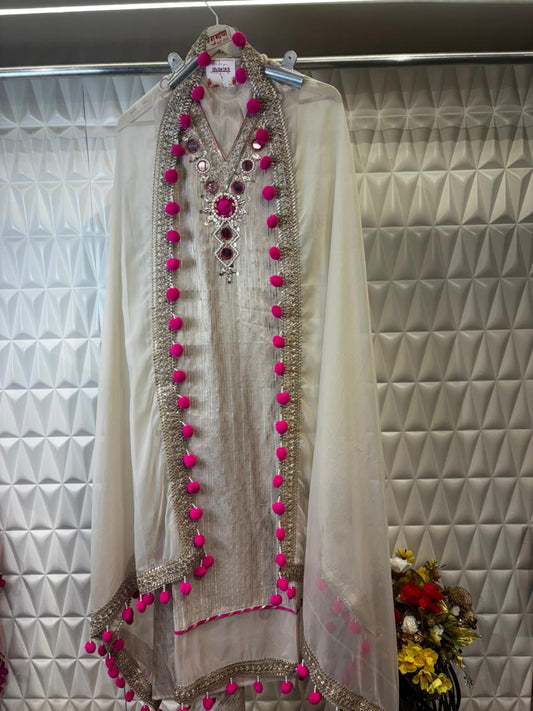 Graceful Tissue Suit Set featuring a soft tissue fabric with a matching tissue dupatta