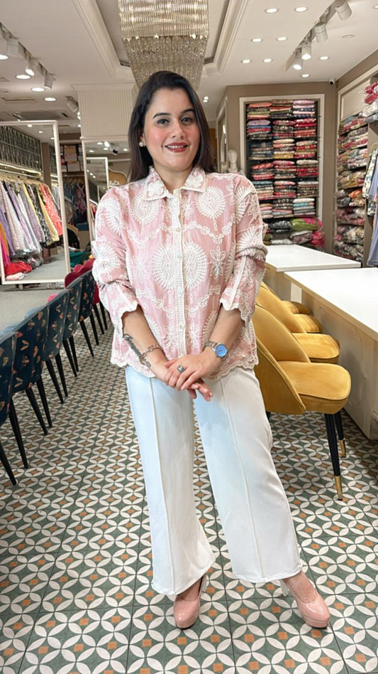 Classic summer shirt with a twist—this cotton-linen piece features soft tailoring