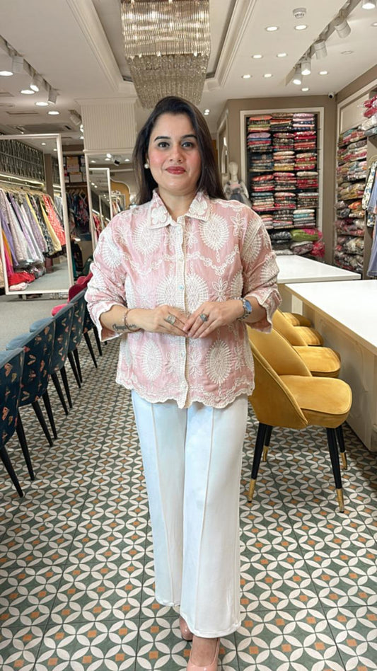 Classic summer shirt with a twist—this cotton-linen piece features soft tailoring