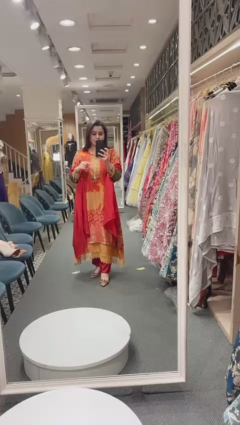 Elevate your style with this vibrant orange ready-made suit set.