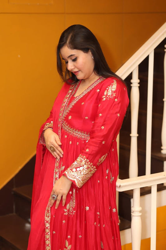 Timeless elegance with this exquisite Anarkali in radiant red