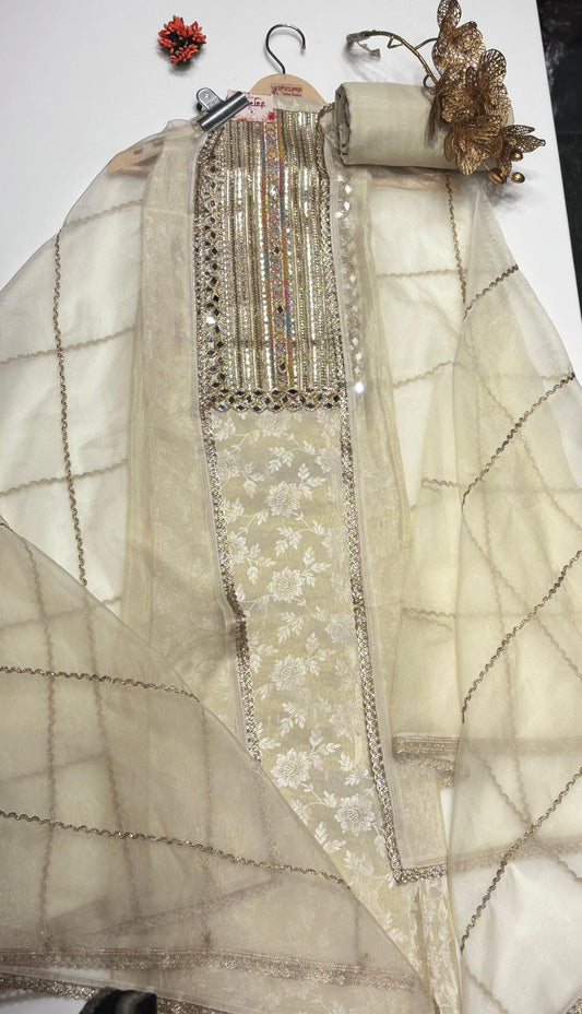 Stunning Organza Suit Set featuring all-over mirror work and embellishments