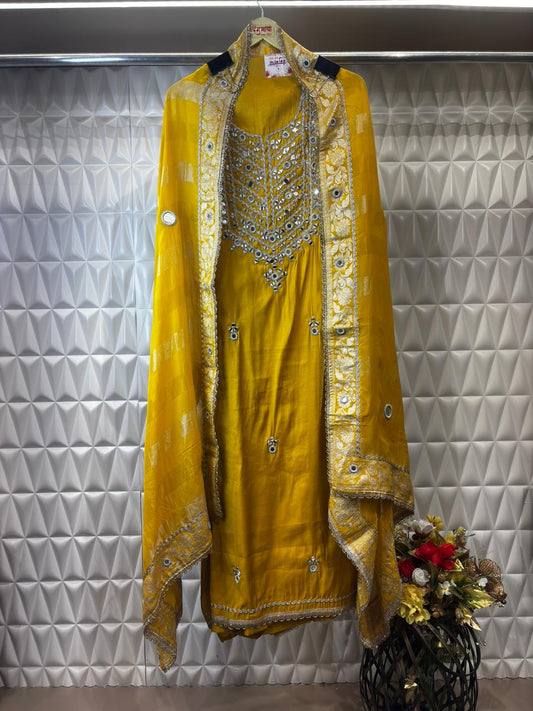 Radiate sunshine elegance in this yellow soft organza suit